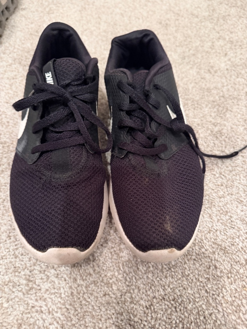 Nike Black Mesh Sneakers with White Swoosh